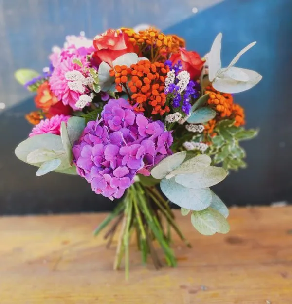 Bouquet arancio rosa e fucsia - immagine 2
